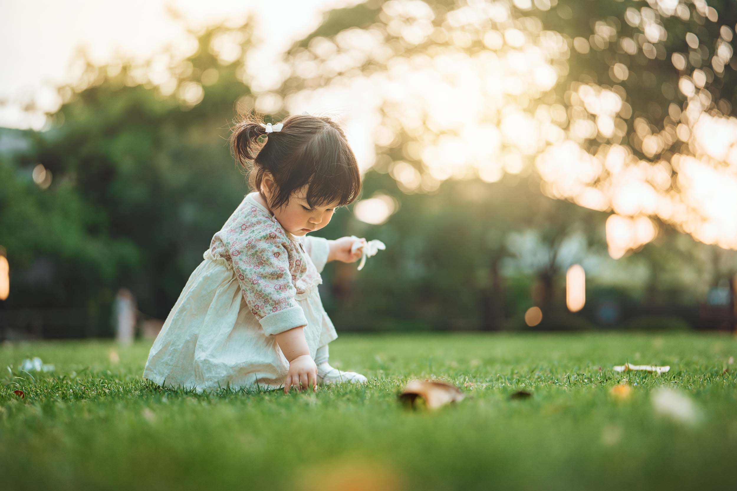 Little girl exploring park