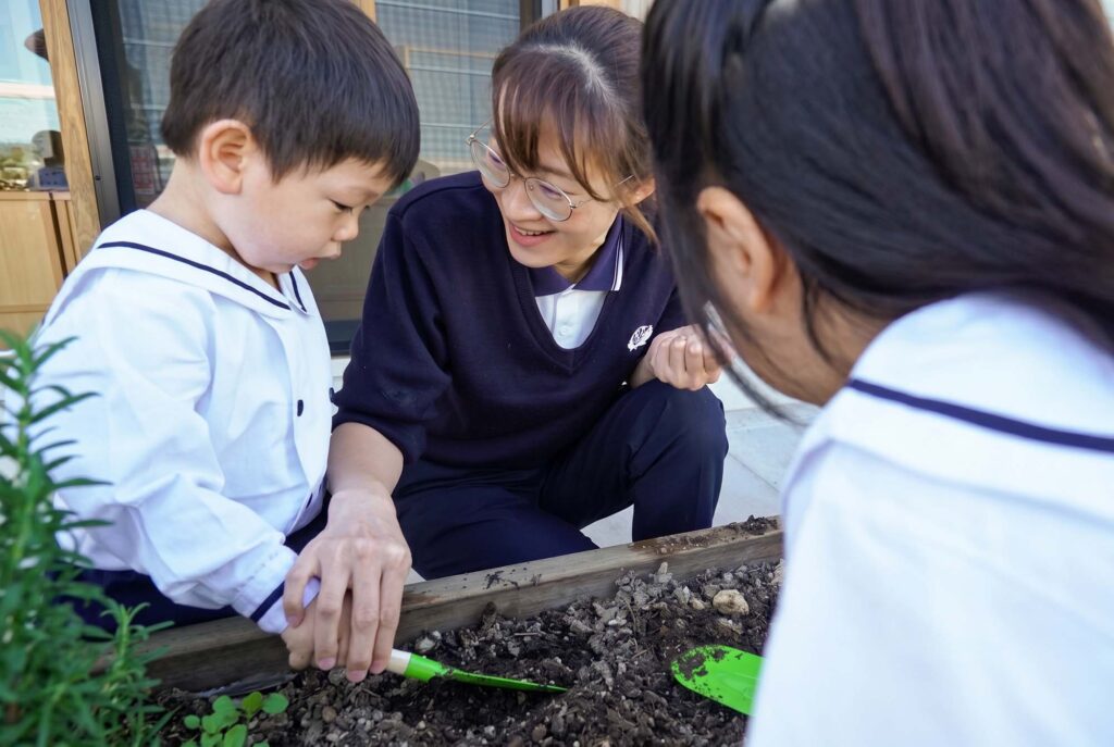 Tzu Chi outdoor environment, children learning about the veggie garden