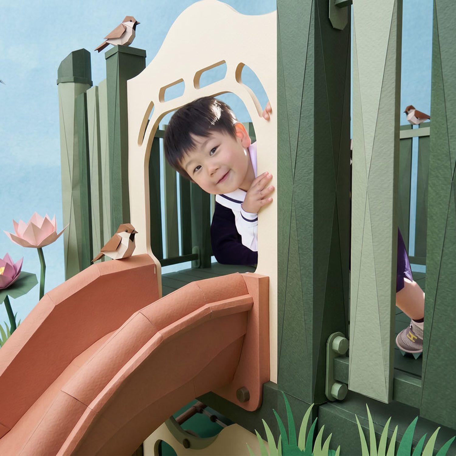 Tzuchi Early Learning wellbeing, child on a slide